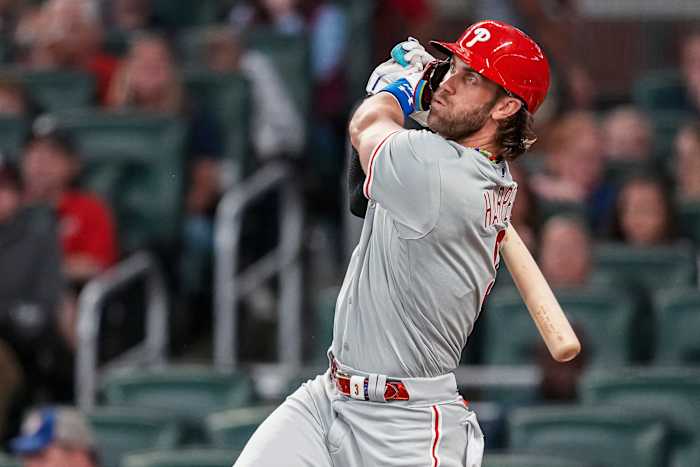Sep 18, 2023; Cumberland, Georgia, USA; Philadelphia Phillies first baseman Bryce Harper (3) watches the ball after hitting a home run against the Atlanta Braves during the third inning at Truist Park.
